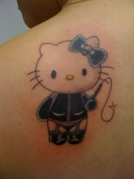 hello kitty tattoo art. dominatrix hello kitty on left